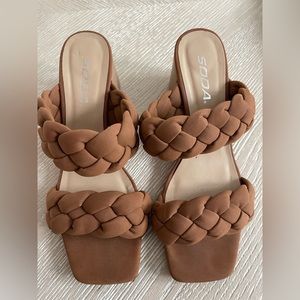 Size 7 brown sandal with braided detail! Purchased from a local boutique!
